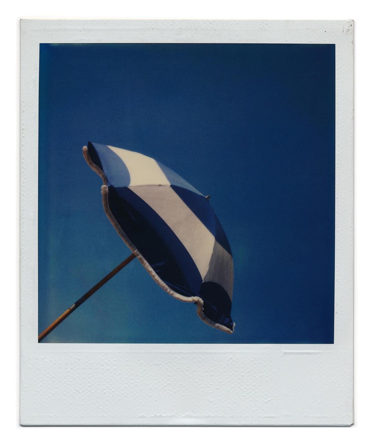 Polaroid SX70 #063 – One Umbrella