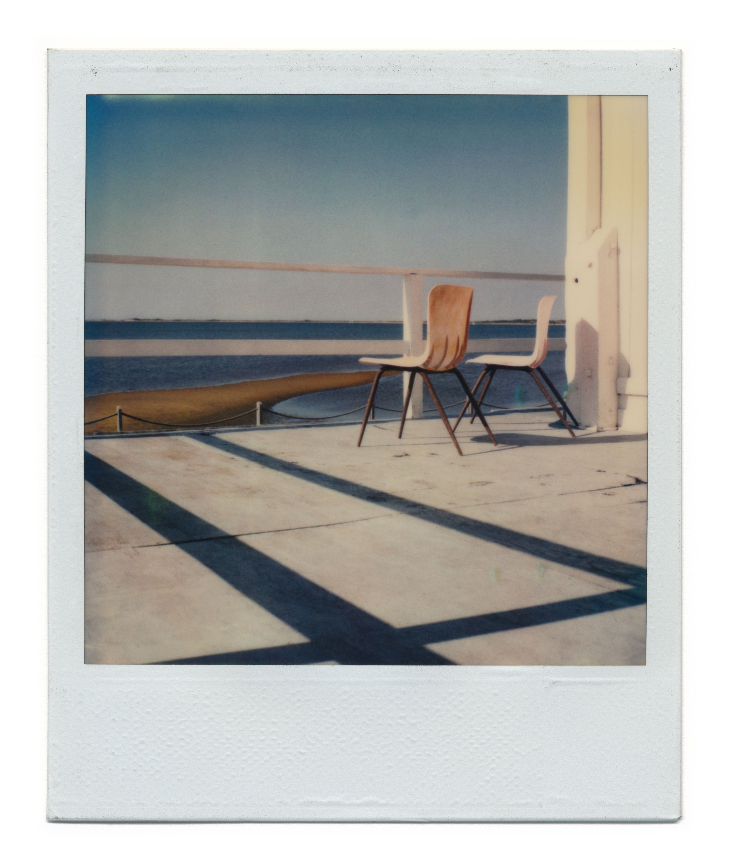 #081- CHAIRS BY THE SEA