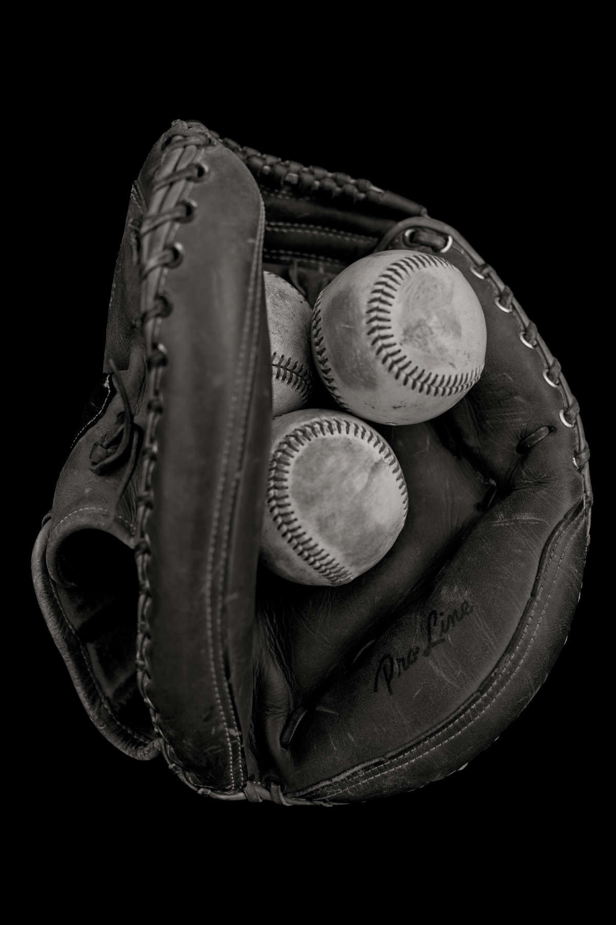 MITT WITH BASEBALLS. LOS ANGELES, CALIFORNIA, 2014