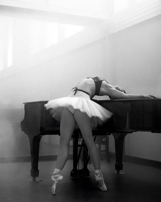 Ashley leaning on piano, New York City Ballet, 2013